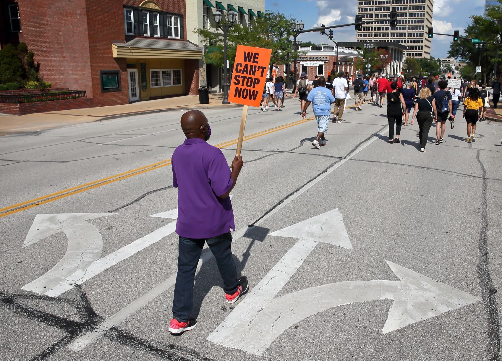 Protesters march for Michael Brown, call for charges against Darren Wilson